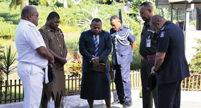 Minister for Defence, National Security and Policing, Inia Seruiratu joins a prayer with leading members of Fiji’s disciplined forces. Photo: RFMF