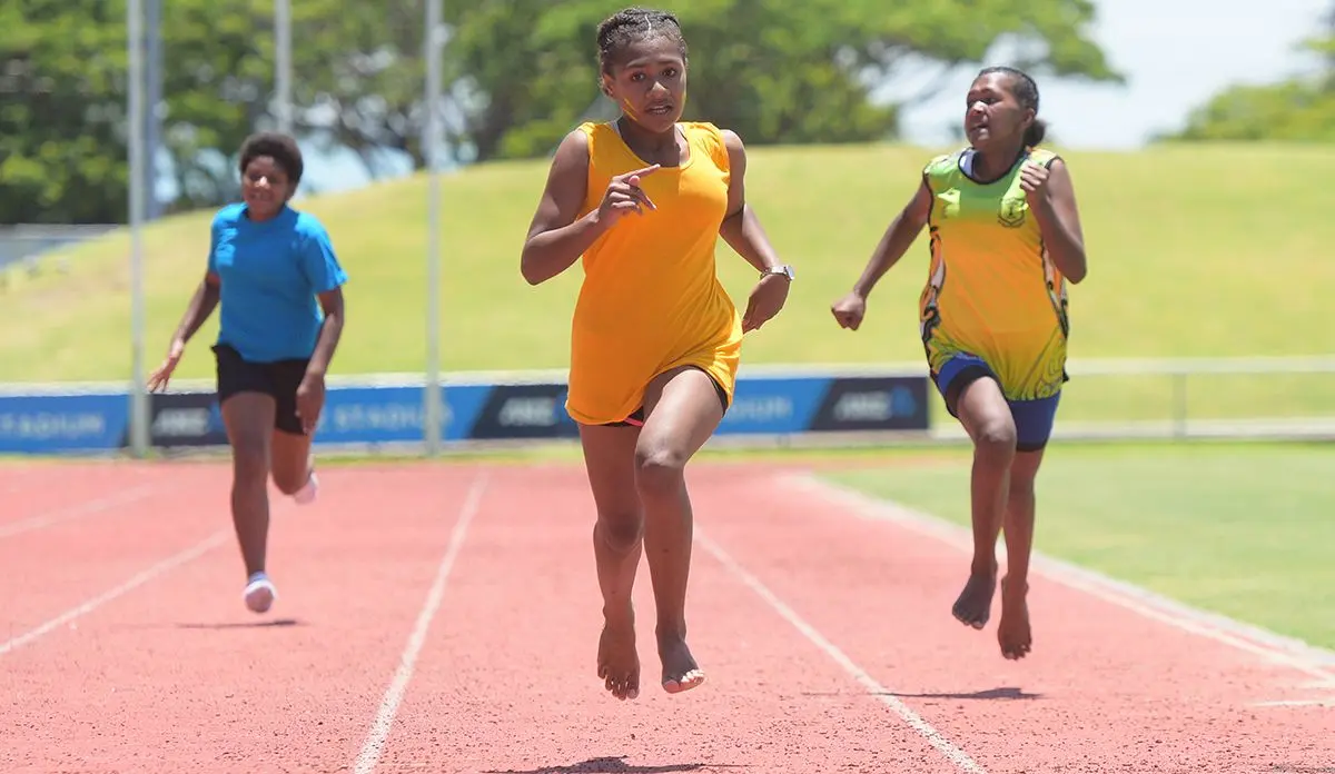 Josavini Dikobau (middle) during Suva Sangam junior-girls  heats at ANZ Stadium on February 19, 2020. Photo: Ronald Kumar.