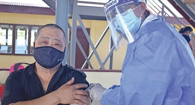 Lance Seeto receives his first dose of AstraZeneca vaccine from staff nurse Yogita Raju at Namaka Public School in Nadi.. Photo: Mereleki Nai