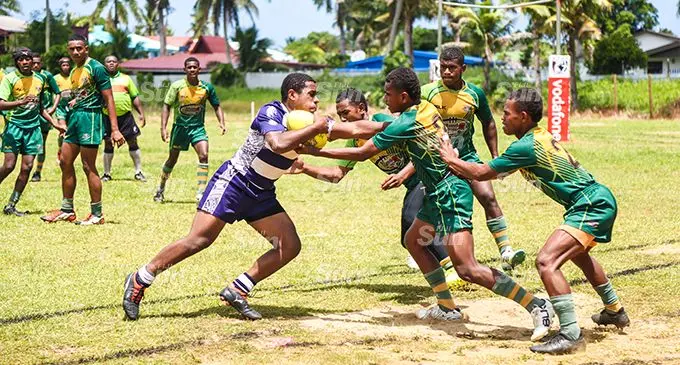Mateo Raikoso of LDS College (with ball) takes on Ratu Latianara College during the Fiji Secondary Schools rugby league Under-17 clash on February 15, 2020. Photo: Kelera Sovasiga 