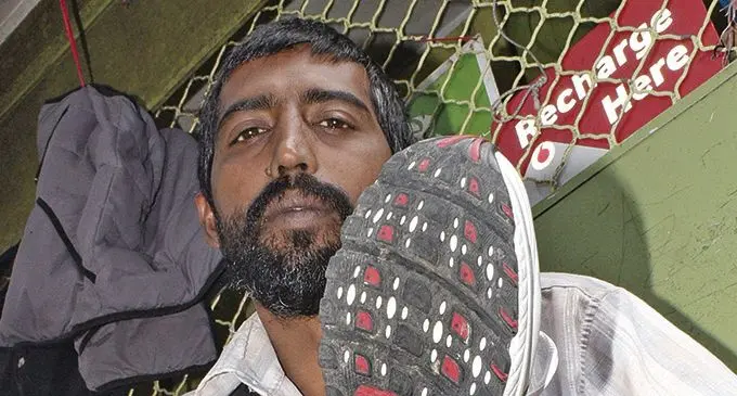 Govind Raj 40, at his shoe repair stall in Suva on October 22, 2020. Photo: Ronald Kumar.