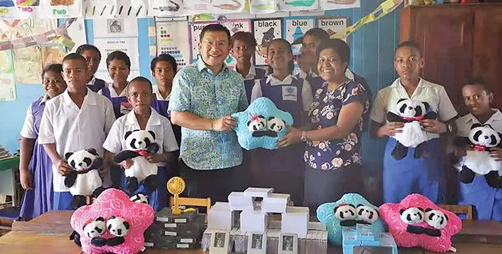 Chinese Ambassador to Fiji, Zhou Jian (middle) donated stationeries to students and teachers at Somosomo District School in Taveuni Island on March 19, 2025.