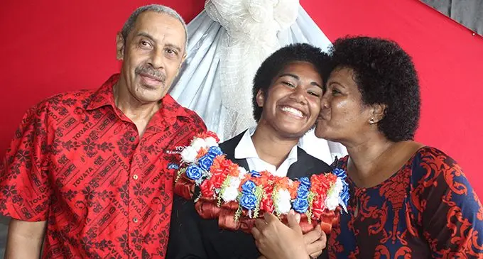From left Wiliame Tuivaga (father), Adi Cakobau School head girl Vilimaina Tuivaga with mother Sulueti Tuivaga after the prefect induction ceremony at ACS  on February 3, 2019.  Photo: Simione Haravanua