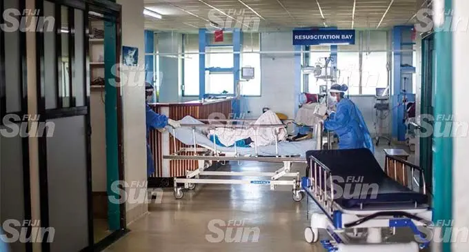 Frontline health workers attend to another patients at the Colonial War Memorial Hospital in Suva on July 22, 2021. Photo: Leon Lord