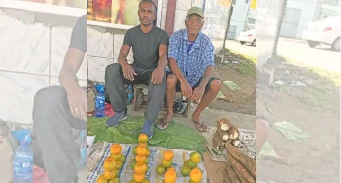 Setareki Vakayadra (left), and Manoa Vugalei with their produce at Nabua, Suva on May 23, 2018.  Photo: Taraivini Seru