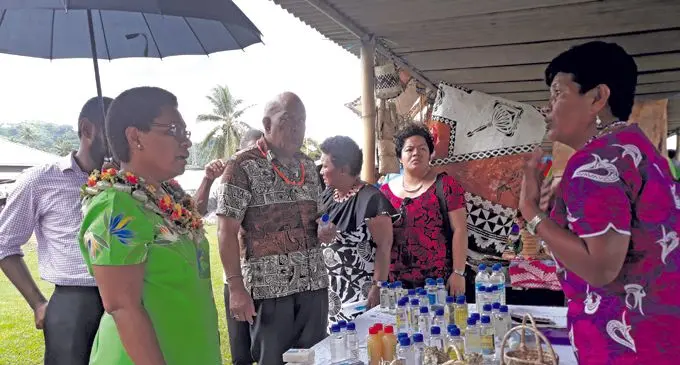 Minister for Women, Children and Poverty Alleviation Mereseini Vuniwaqa (left) visiting stalls during the Northern craft show at the Foreshore Park in Savusavu on February 2018.