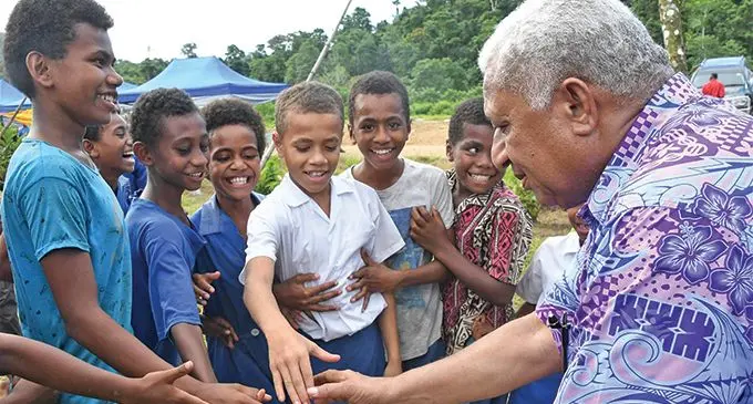 Prime Minister Voreqe Bainimarama with the children from Wainawaqa Village on April 10, 2019. Photo: DEPTFO News