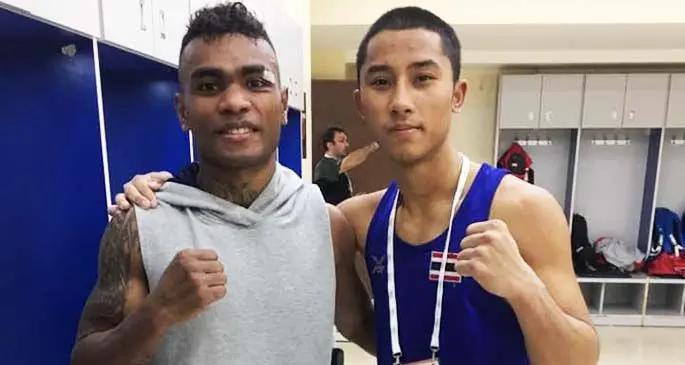 Gracious in defeat... Jone Davule Koroilagilagi (left) with Phoemsap Atichai of Thailand after their fight in the Olympic Games qualifier in Amman , Jordan on March 4, 2020.