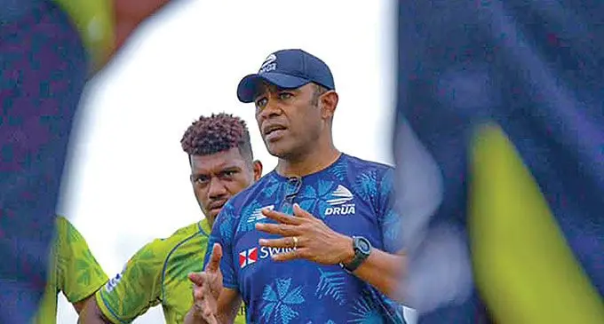 Fijian Drua strength and conditioning coach Naca Cawanibuka and Fijian Drua head coach Glen Jackson (inset) during a training session at Wailoaloa Beach earlier this month. Photos: Fijian Drua