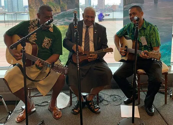 Prime Minister Voreqe Bainimarama enjoys a musical moment with Fijian musicians in New York.