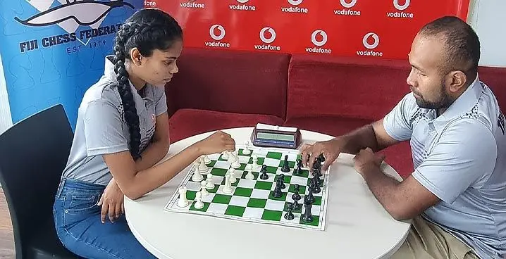 National champion Candidate Master (CM) Taione Sikivou (rigt) and women’s champion Tanvi Prasad on January 18, 2023. Photo: Fiji Chess Federation