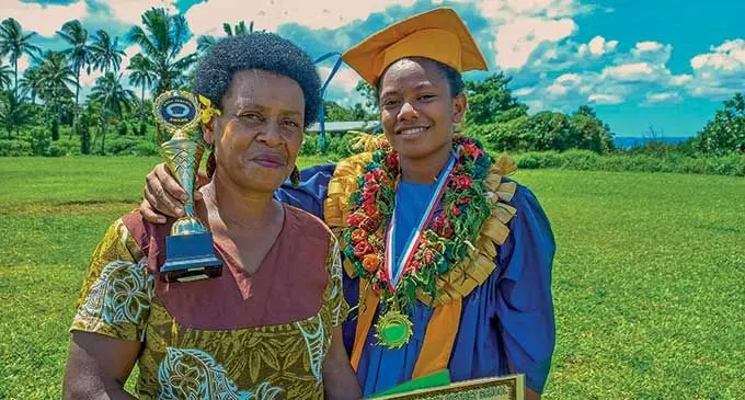  Waiqanake District School Year 8 student Salanieta Nailagi with her mother Camari Naiqara  after scoring the highest marks in “Vosa Vaka Viti “ during the prize giving ceremony in Lami on March 28, 2022.  Photo: Sheenal Charan