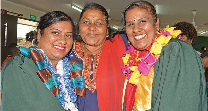 Sisiters Devika Maharaj and Radhika Maharaj with their mum, Lalita Kaur following their Makoi Womens Vocational Training Centre graduation on December 9, 2021. Photo: Ronald Kumar