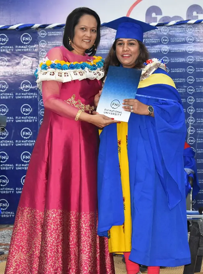 Chief Guest, Minister for Education Rosy Akbar presents a certificate to a FNU College of Humanities and Education graduate on May 1, 2019. Photo: Fiji National University