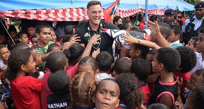 Former All Blacks and Crusaders  fullback Israel Dagg with students of Holy Trinity Anglican School on May 30, 2019.  Photo: Ronald Kumar