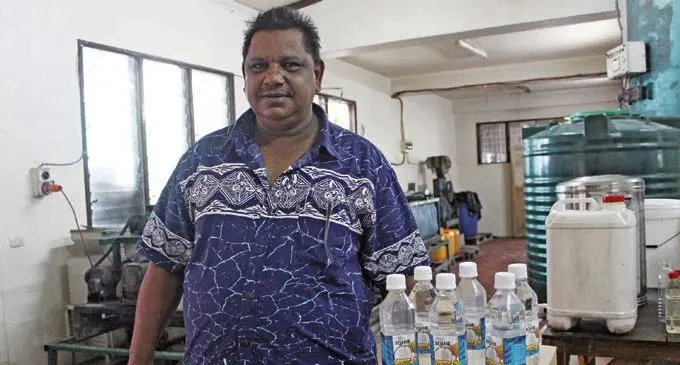 Jagdish Chand, 55, of Vunika, Labasa, with his products at his processing building in Labasa.  Photo: Wati Talebula