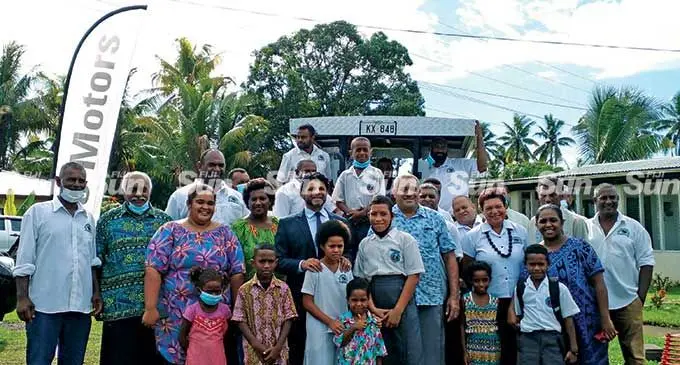 The Attorney-General and Acting Prime Minister, Aiyaz Sayed-Khaiyum, with members of the Ratu Naevo Farms Cooperative at Nawaka Village, Lautoka.  Photo: Salote Qalubau