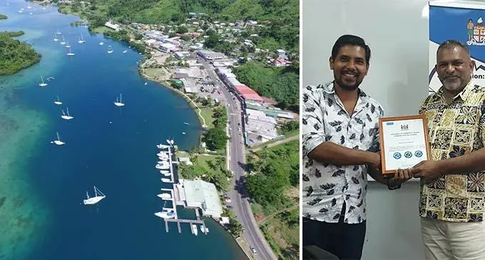 (L)-The Hidden Paradise of Savusavu. (R)-Harshad Joshi with Minister for Commerce, Trade, Tourism and Fijian  Transport Faiyaz Koya.