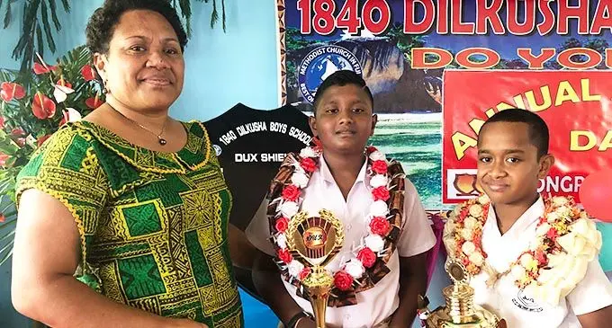 From left: The mother of the late Marika Sovaki, Alena Sovaki, Dilkusha, Boys School dux recipient Antariksh Deo and Viliame Sovaki.    Photo: Shreeya Verma