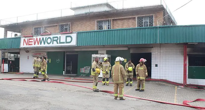 Firefighters after containing the fire at New World Super market Rewasa Suva on February 14,2019.Photo:Simione Haravanua.