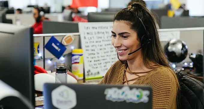 An IT helpdesk officer at work.
