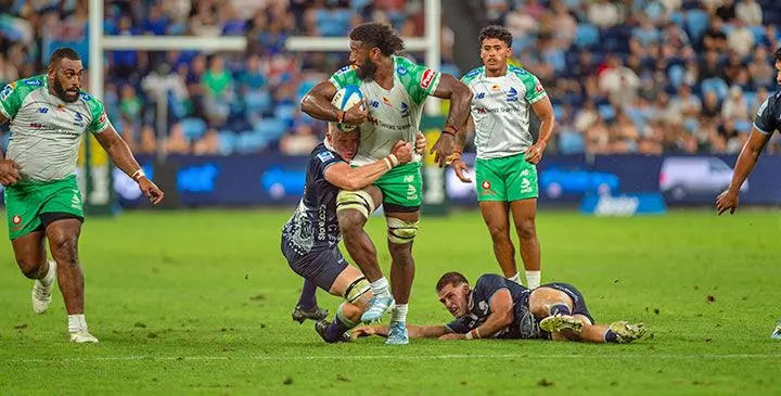 Swire Shipping Fijian Drua blindside flanker Joseva Tamani is tackled by a Waratahs player as he finds support during their Super Rugby Pacific round three clash at Allianz Stadium, Sydney, Australia on February 28, 2025. Photo: Leon Lord