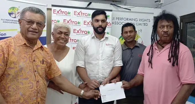 Representatives from Extra Supermarket with Fiji Performing Rights Association (FPRA) representatives.