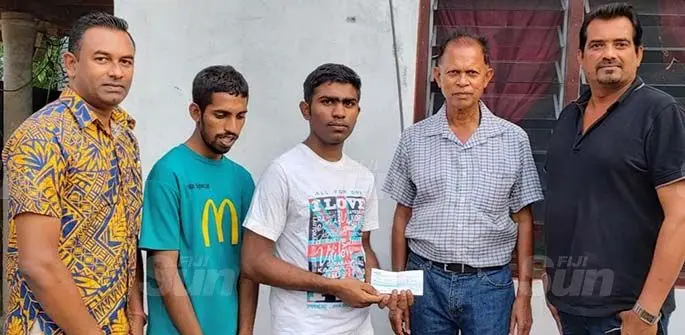From left: Nadi Special School counsellor Mohenesh Singh, brothers Jayesh Mishra and Rohal Ram, Sathya Sai Service Organisation of Fiji’s Professor Narendra Reddy and Navo Sai branch chairperson Jerry Gounder during the cheque presentation on July 22, 2020. The funding will to pay a year’s rent for the brothers’ flat. Photo: Waisea Nasokia