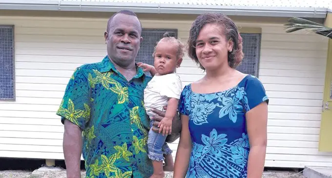 Sailosi Drili with his daughters Vilimaina Ana Vunisa, 8 months, and Kelesi Lewano, 17, outside their new home at Natokalau Village in Cicia, Lau on January 29, 2019. Photo: Wati Talebula