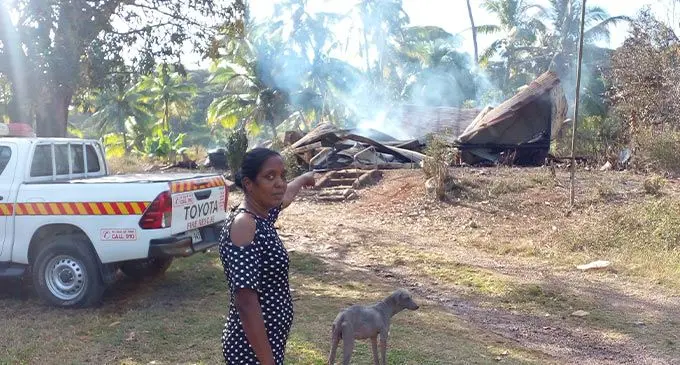 Vikashni Naicker points at what is left of her home at Lomolomo, Lautoka after a fire  destroyed it on July 27, 2022. Photo: Salote Qalubau
