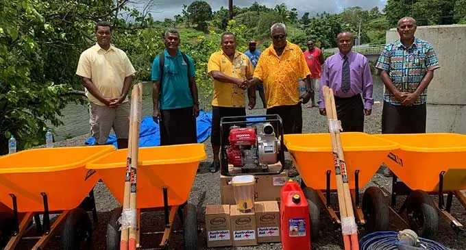 Minister for Rural and Maritime Development and Disaster Management Hon. Inia Seruiratu, Commissioner Eastern Division Mr. Vitale Varo, Divisional Planning Officer Eastern Mr. Mitieli Ratinisiwa with Moturiki chief Ratu Waisale Draunidalo during the handover of equipment to villagers of Moturiki at the Waidalice Landing in Tailevu yesterday.