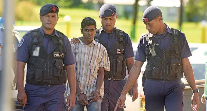 Murder accused Samuel Naicker escorted to the Nasinu Court by Police officers on June 2, 2022.  Photo: Ronald Kumar