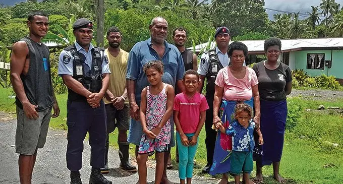 Police Constable Jovesa Tulala (2nd from left), Korotogo Village headman Apimeleki Ratubualiku (4th from left) and Constable Leveni Tokamato (6th from left) with villagers of Korotogo, Coral Coast,  on February 11, 2021. Photo: Mereleki Nai