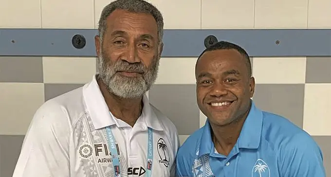 Legendary 7s rep and coach Tomasi Cama Snr and Fiji Airways Fijian 7s rep Alasio Naduva with the Hong Kong 7s trophy. Photo: FRU Media