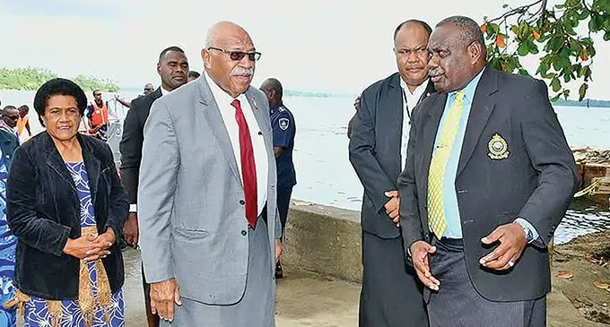 Prime Minister Sitiveni Rabuka, wife, Sulueti, and Tailevu Provincial Council Rusiate Tudravu on Bau Island during the installation of Na Turaga Na Vunivalu Na Tui Kaba, Ratu Epenisa Cakobau, on March 10, 2023. Photo: DEPTFO News