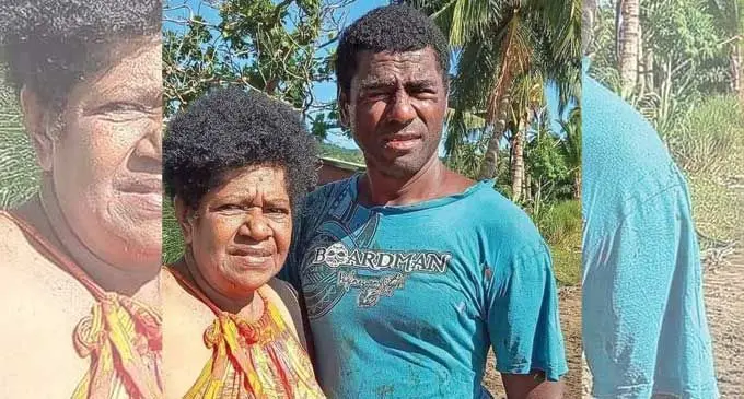 Kali Koroi with a relative after he was rescued on March 13, 2022.  