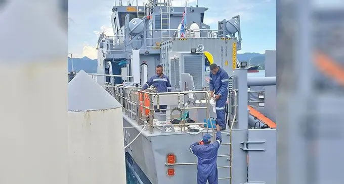 Navy officers complete repairs (encircled in red) on the new RFNS Timo docked at the navy pier. Photo: Fiji Navy