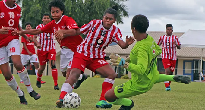 Labasa’s Asenaca Diranuve on attack against Rewa’s goalkeeper Merevesi Fuga.