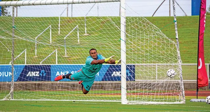 Navua goalkeeper Senirusi Bokini misses Nasinu’s Jashnit Vikash’s freekick during their Digicel Premier League match at the ANZ Stadium on March 20, 2022. Photo: Leon Lord.