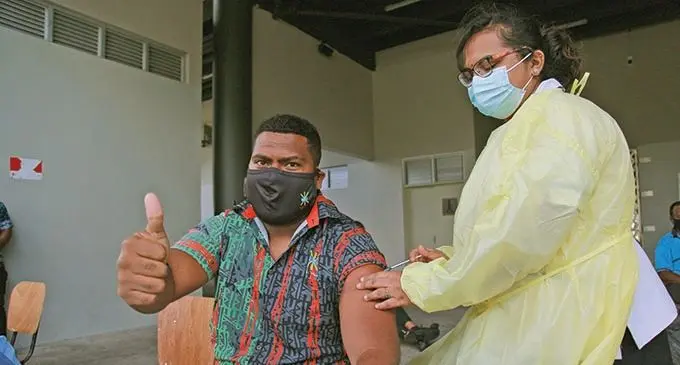 Naitasiri rugby prop Apakuki Naivanawalu gets his second jab from Staff Nurse Komal Nand at Albert Park, Suva, on August 26, 2021. Naivanawalu, is a former Fijian Warriors and Fijian Drua rep who is after a spot in next year’s Drua squad for the Super Rugby competition. Photo: Leon Lord