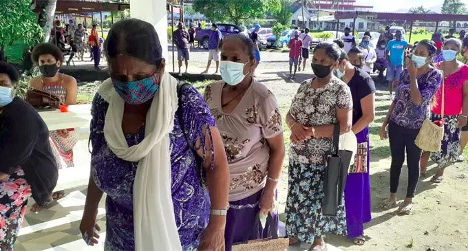 A long line of people waiting to be vaccinated at the Vashist Muni hall in Navua on July 24, 2021. Photo: Ronald Kumar