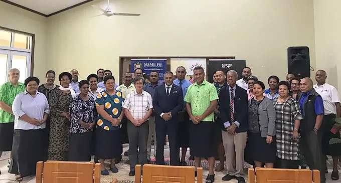 International Management trainer, Steve Cordeiro (in checkered shirt) flanked by Minister for Commerce, Trade, Tourism and Transport, Faiyaz Koya, and iTaukei Trust Fund Board chief executive officer, Aisake Taito, with some participants of the Train the Trainers workshop in Suva, on April 26, 2022. Photo: Laisa Lui