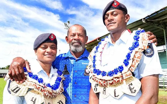 Family of Police officer's...retired Police Inspector Taito Waqavakatoga with his daughter Diana Waqavakatoga and son, Waisale Waqavakatoga following the basic police recruitment pass out parade 2020 at Ratu Cakobau Park in Nausori on July 16, 2020. Photo: Ronald Kumar.