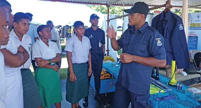 Fiji Police Force’s Special Response Unit PC Jone Mau informing Lautoka school students on the process and procedures of search and rescue during the roadshow at Shirley Park on April 11, 2019. Photo: Rohit Kumar