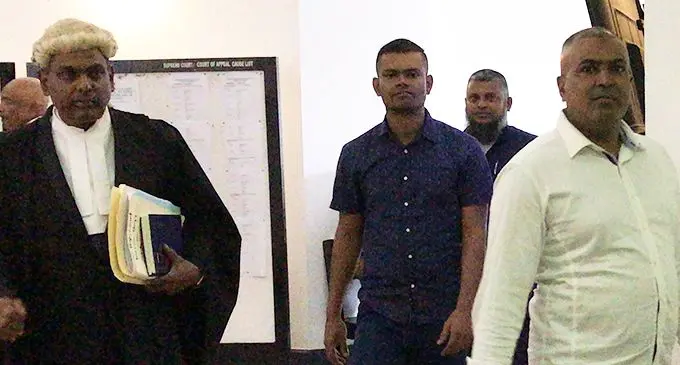 Lawyer Jitend Reddy, left, with Roneel Ravinesh Chand and Karim Begg (back), outside the High Court in Suva on June 3, 2020.  Photo: Ashna Kumar