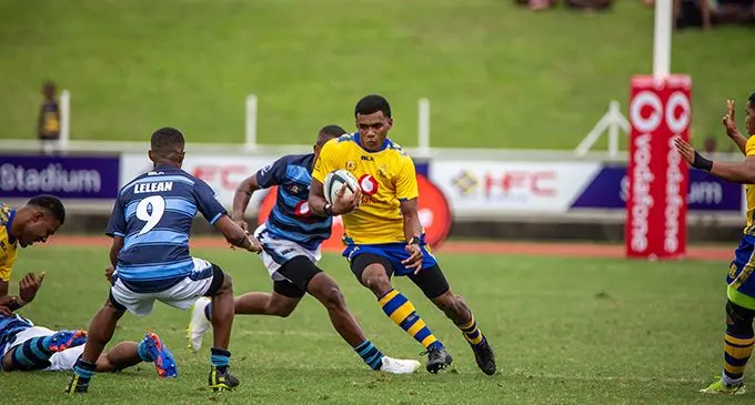 Suva Grammar School Under-18 second five eight Victor Sigavou looks for a gap in the Lelean Memorial School defence in their Vodafone Deans Trophy clash, this afternoon. Photo: Leon Lord
