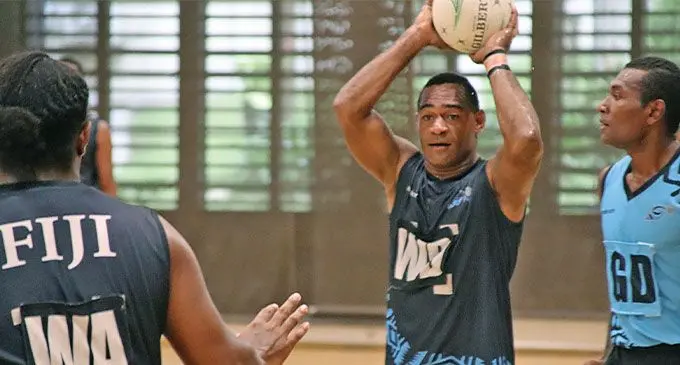 Fiji Black wing defence (WD) Vilive Wainidroa (with ball) looks for support during the Fiji men’s trials against Fiji Blue at the Fiji National University (FNU) gymnasium, Nasinu on October 12, 2024. Photo: Netball Fiji