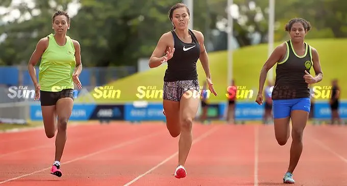 Braelynn Yee (middle) won the 100meters open womens grade alongside Chloe David (left) and Tokasa Gukirewa during Easter Athletics Championship at the ANZ Stadium on April 16, 2022. Photo: Ronald Kumar