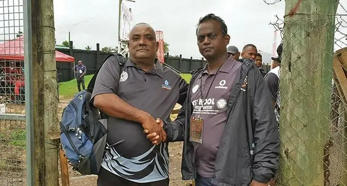 Suva football coach Babz Khan (left) shakes hand with newly appointed Ba football coach Kamal Swamy. Photo: Suva Football