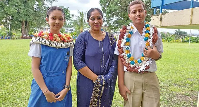 Year 8 teacher Shovna Chand flanked by head girl Taanvi Prasad and head boy Viliame Tokalauvere.  Photo: Sheenal Charan